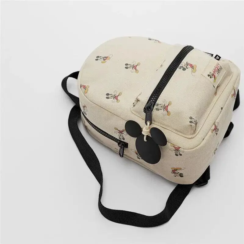 New 25X17X9 cm Disney cartoon Mickey Mouse New Kids Backpack Mini Schoolbag Girls and Boys Cute Shoulder Bag New 25X17X9 cm Disney cartoon Mickey Mouse New Kids Backpack Mini Schoolbag Girls and Boys Cute Shoulder Bag